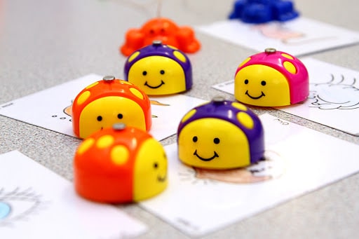 A speech therapist using visual aids to help a child improve their speech in Brampton